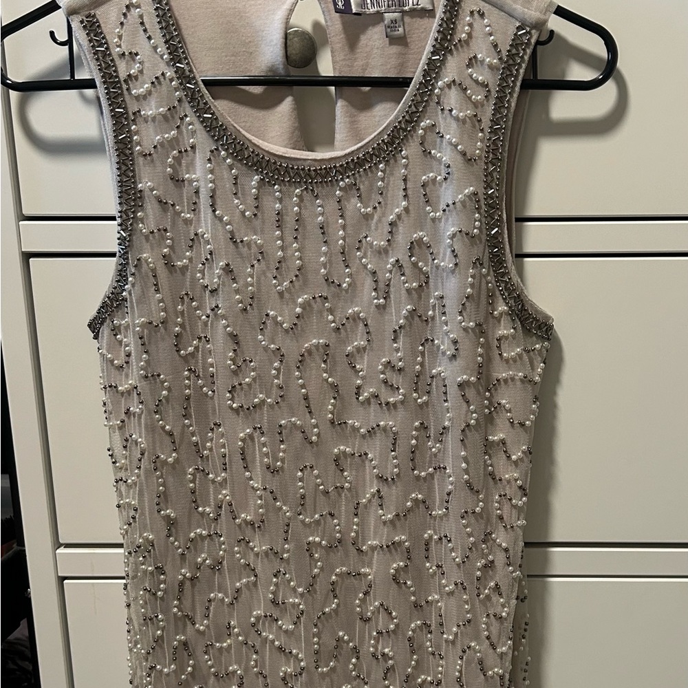 Beautiful beaded tank top.Night out statement top.